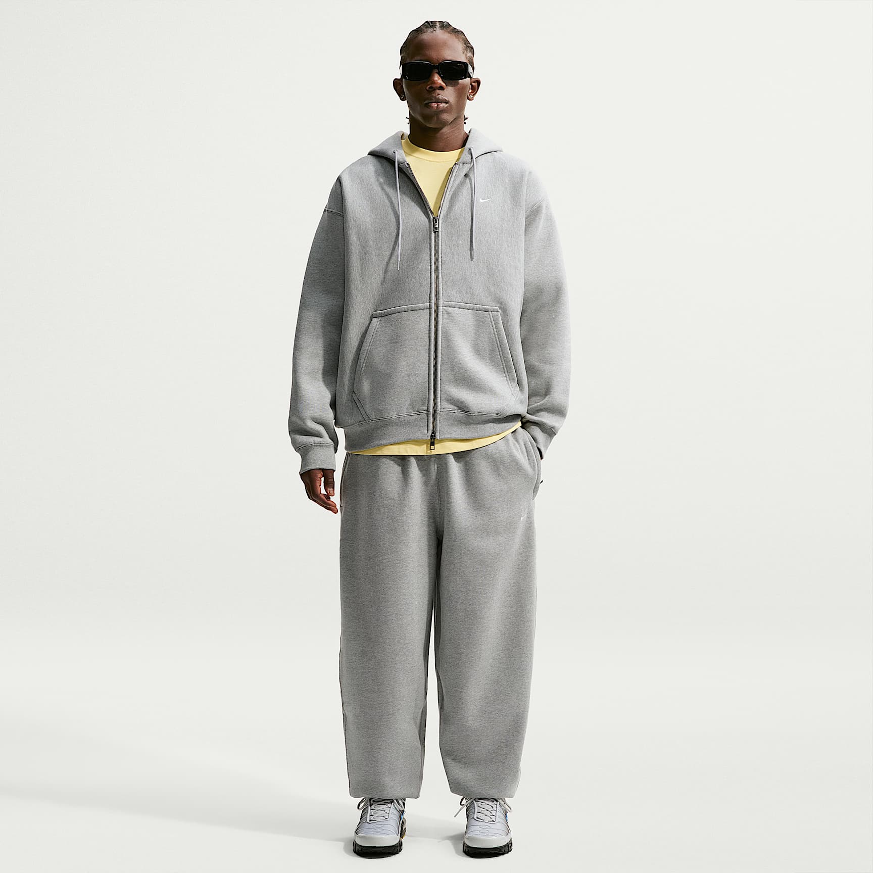 Nike Solo Swoosh Men's Cuffed Fleece Trousers. Nike LU